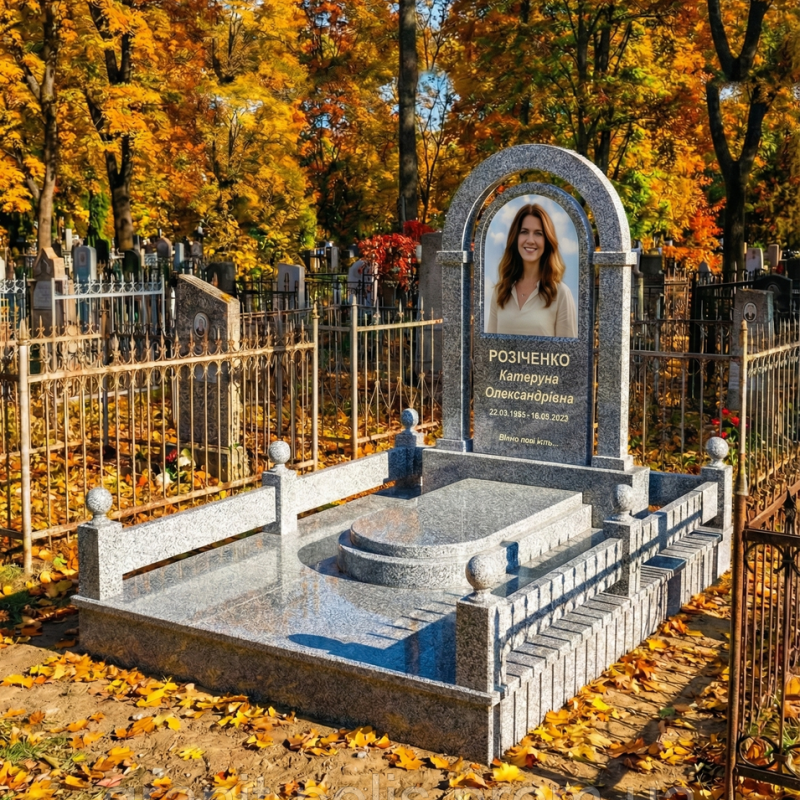 Меморіальний комплекс з червоного граніту з аркою